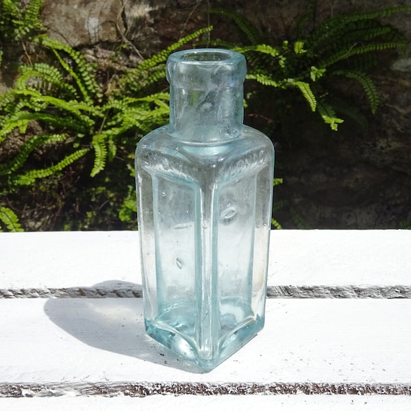 Victorian aqua Castle Brand Co. hat polish bottle, Newcastle & London bottle, antique square aqua bottle with bevelled sides, bud vase