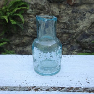 Antique aqua glass bottle, small shear top Sharps&#39; Furniture Cream, Leeds bottle, burst top bottle, embossed bottle, bud vase, shelf decor