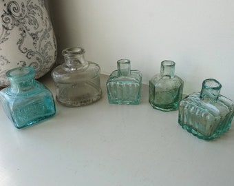 Antique glass ink bottle x1, aqua Fields Ink & Gum, octagonal, ribbed with pen rests, clear oval British Isinglass Co Ltd Grimsby bottle