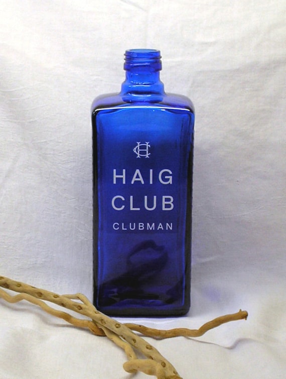 Bouteille de whisky Haig Club Clubman bleu foncé, motif en relief.  Fabriquez un pied de lampe ou un bougeoir. Breweriana, pub, auberge, bar.  Vase bourgeon, artisanat -  France