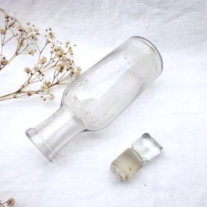 Antique clear glass bottle with glass stopper embossed Stephenson Brothers Furniture Cream. Wood Brothers bottle, Victorian stoppered bottle