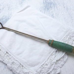 Vintage meat fork or toasting fork. Green wooden handle, kitchen utensil, kitchenalia, serving utensil, two pronged long fork, 1930s utensil