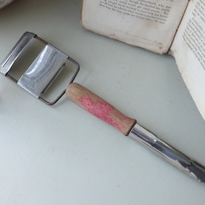 Vintage potato peeler, double ended vegetable peeler, cheese slicer. Mid century retro, wooden handle, kitchenalia, kitchen utensil, cooking