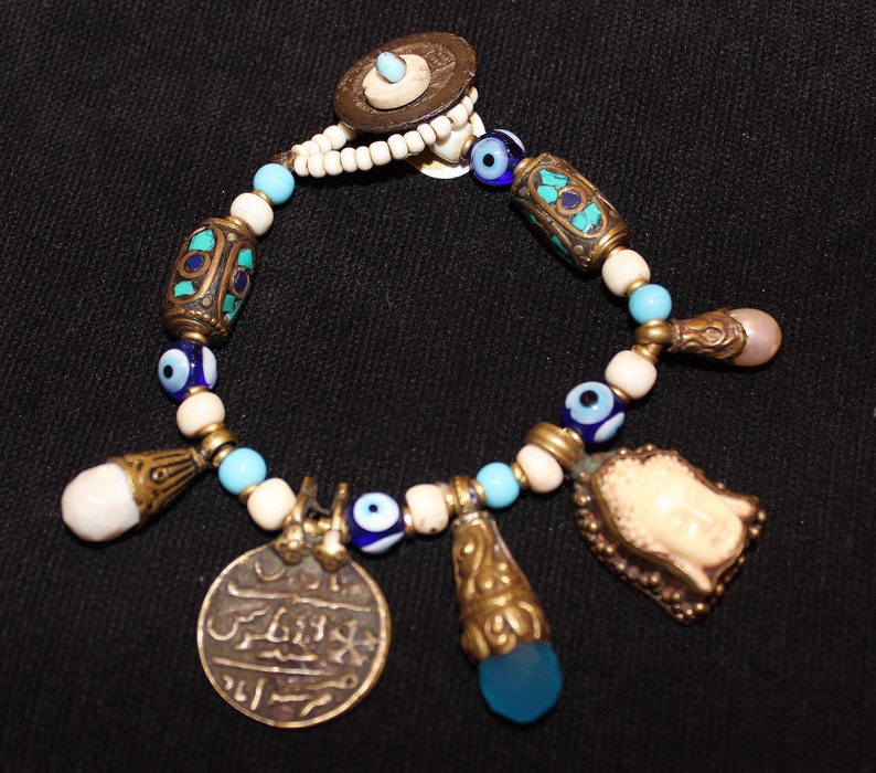 white Buddha juju trade bead bracelet with rare ancient bronze coin