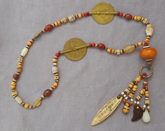 white Buddha juju trade bead bracelet with rare ancient bronze coin