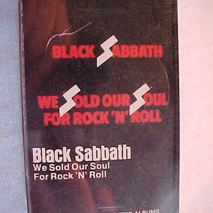 May include: Black Sabbath cassette tape with the album title "We Sold Our Soul For Rock 'N' Roll" printed on the front. The cassette tape is black with red and white text.