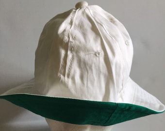 White bucket hat cheap green under brim