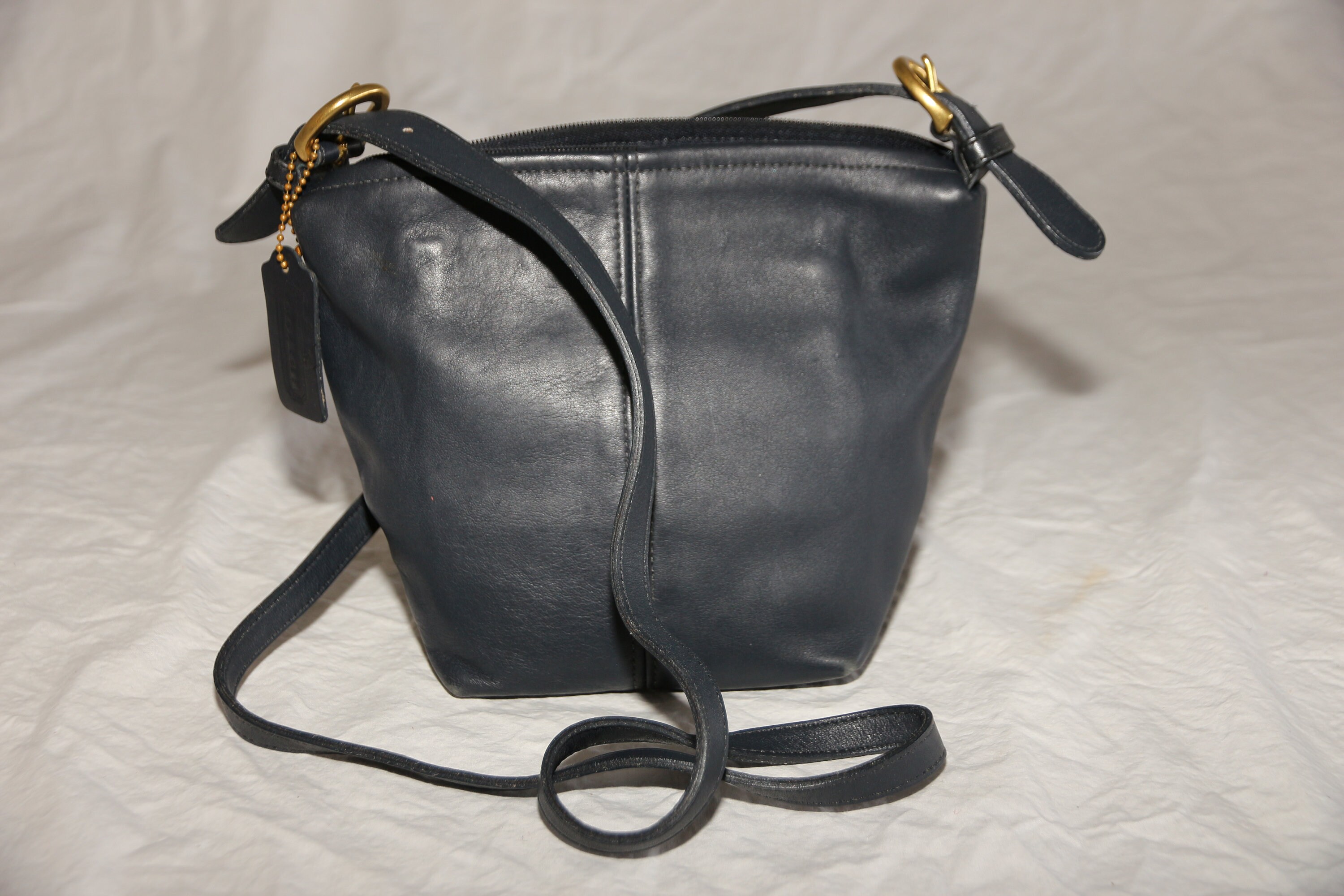 small navy blue coach purse