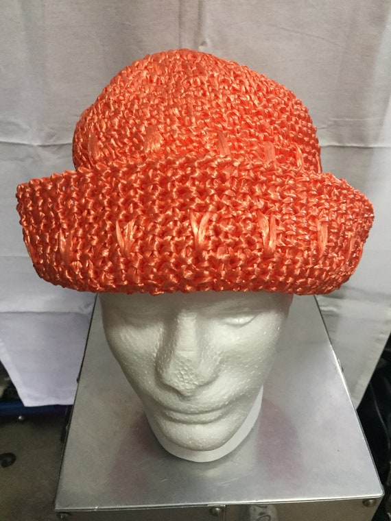 bright orange hat