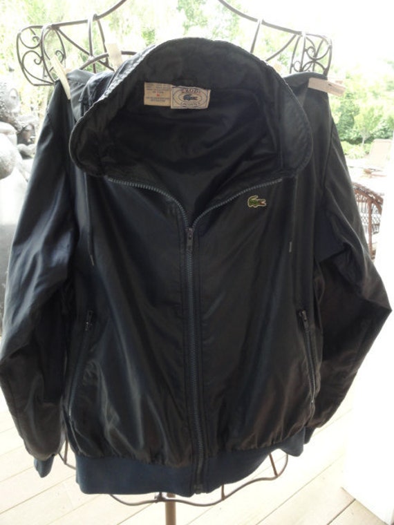 Vintage Izod Lacosta Navy Blue Windbreaker Jacket Hidden Hood Nylon Size Medium
