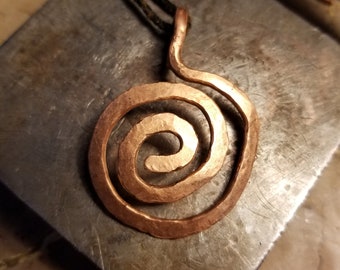 Spiral hammered copper pendant
