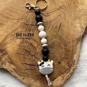 Porte-clés vache, perles de silicone, tirette, breloque sac à dos