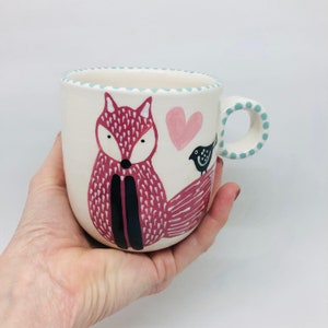 Handmade Ceramic Mug Hand Painted with a Red Fox, a Black Bird and a Pink Heart, Hygge Mug, Mugs and Cups, Handmade Mug, Fox Lover