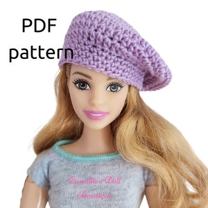 Peut inclure: Un béret en crochet violet pour poupée. Le béret est réalisé en point de crochet simple et présente un design classique et simple. Patron PDF inclus.
