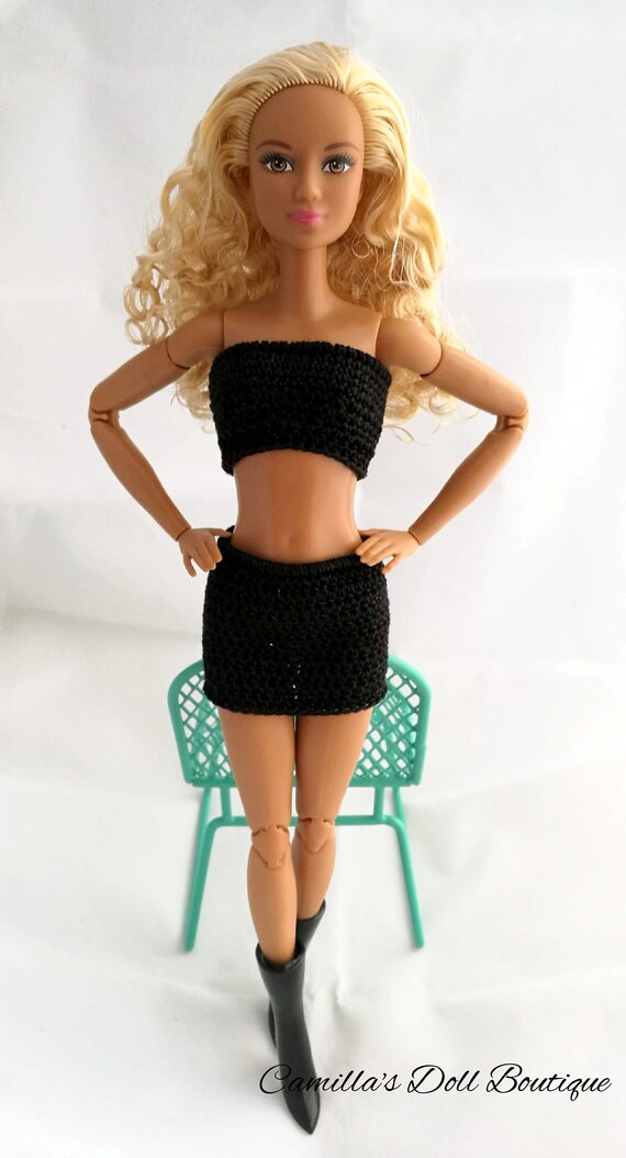 made to move black barbie
