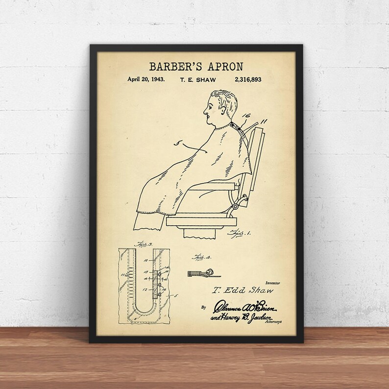 May include: A vintage patent drawing for a barber's apron. The drawing shows a person sitting in a barber's chair wearing the apron. The patent number is 2,316,893 and the date is April 20, 1943. The inventor is T. Edd Shaw.