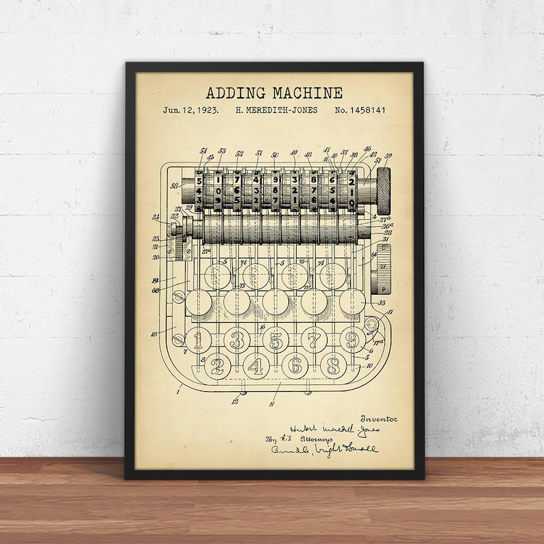 May include: A black and white vintage patent drawing of an adding machine. The patent is titled "Adding Machine" and was filed on June 12, 1923, by H. Meredith-Jones. The patent number is 1458141.