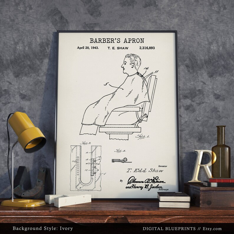 May include: Black and white line drawing of a barber's apron patent. The patent is titled "Barber's Apron" and was filed on April 20, 1943, by T. E. Shaw. The patent number is 2,316,893.