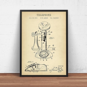 May include: A vintage black and white illustration of a rotary telephone patent drawing. The patent is titled "TELEPHONE" and includes the inventor's name, F.M. Gaele, and the patent number, 1643866. The drawing shows a detailed view of the telephone's components, including the receiver, dial, and base.