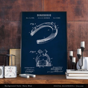 May include: A vintage patent drawing of a horseshoe design on a navy blue background. The drawing shows the horseshoe in detail, with labels for each part. The patent information is included: "HORSESHOE", "Nov. 8, 1898", "P. & J. P. HOPPESCH", "No. 613883".