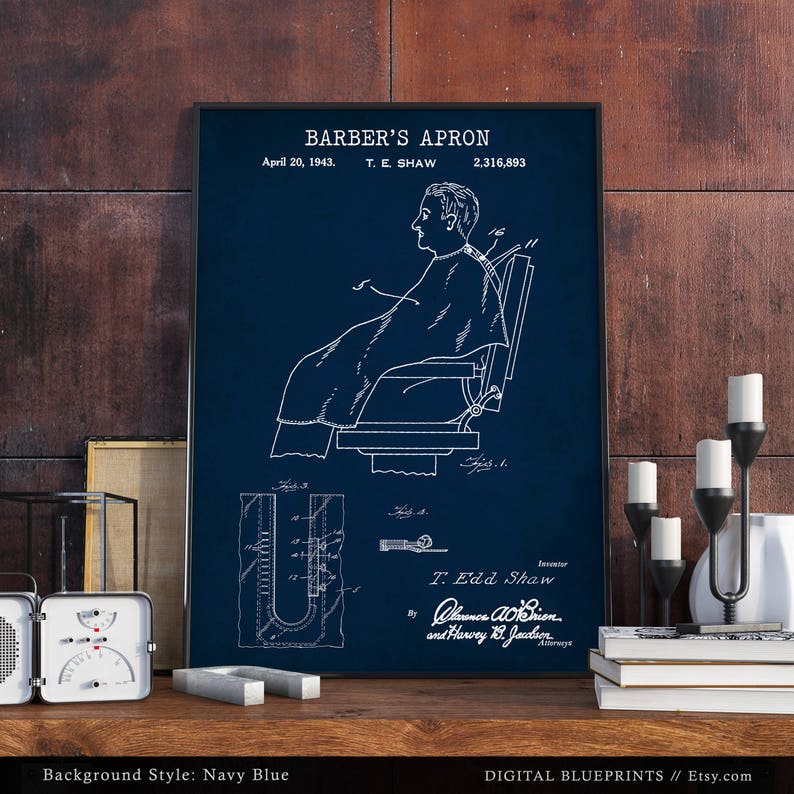 May include: A vintage blueprint illustration of a barber's apron, patent number 2,316,893, dated April 20, 1943. The illustration shows a person sitting in a barber's chair wearing the apron. The blueprint is on a navy blue background.