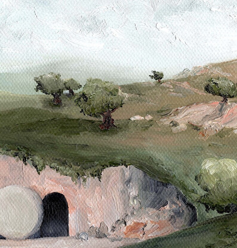 May include: A painting depicting a stone tomb with a large, round stone rolled away, revealing a dark opening. The tomb is situated on a grassy hillside with several olive trees in the background. The sky is a light blue with white clouds.