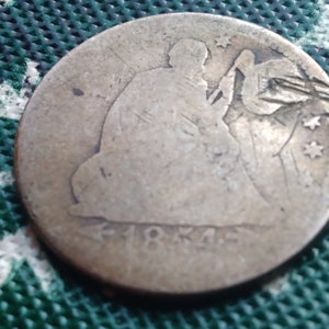 1854 O Seated Liberty Quarter.  Filled,  Better date not so great shape.  #J3248