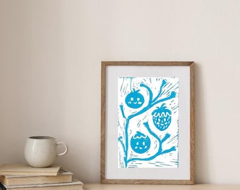 Grabado en linóleo de ramas frutales