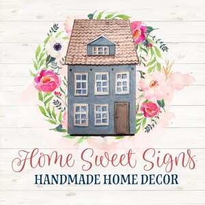 May include: A watercolor illustration of a blue house with a brown roof and white windows. The house is surrounded by pink and white flowers and green leaves. The text "Home Sweet Signs" is written in pink script below the house, and "HANDMADE HOME DECOR" is written in blue text below the script.