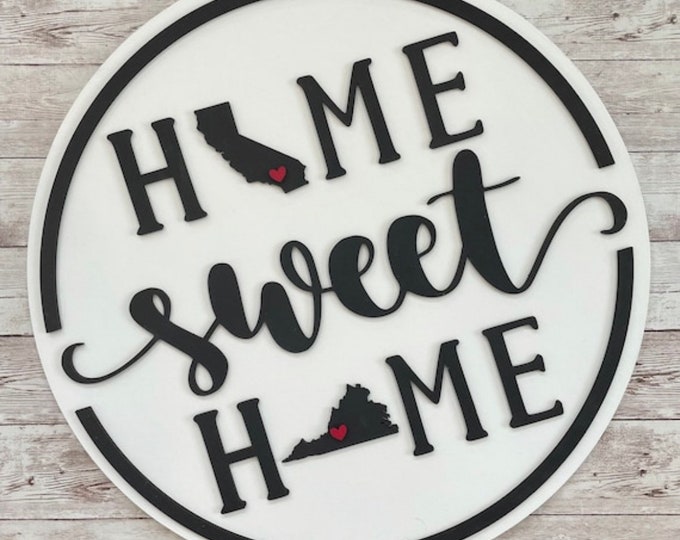 Need a going away gift?  Give a perfect gift to your friend moving out of state with our round “Home Sweet Home” two state wood sign!
