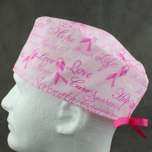 Pink ribbon awareness tieback scrub hat, surgical hat, chefs hat, head cover cap with options for Terry Cloth Sweatband and/or Buttons