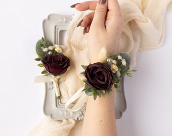 Maroon wrist corsage Deep red boutonniere set Bridal arm accessories Groomsmen pocket buttonhole Burgundy wedding Baby breath rose corsage