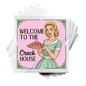 May include: A stack of white paper napkins with a pink and green graphic. The graphic features a vintage illustration of a woman holding a tray of red objects, with the text "WELCOME TO THE CRACK HOUSE".