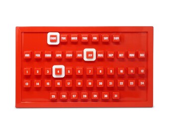 1970s Red Plastic Perpetual Calendar