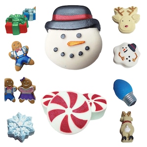 May include: A set of Christmas-themed bath bombs featuring a snowman, gingerbread people, reindeer, candy canes, a snowflake, and a light bulb.