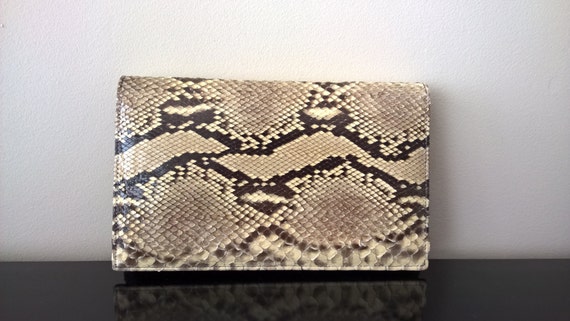 snakeskin clutch