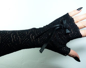 gants chauffe-poignets méga longs sans doigts noir + rose/nœud gothique accessoire famille Addams noire