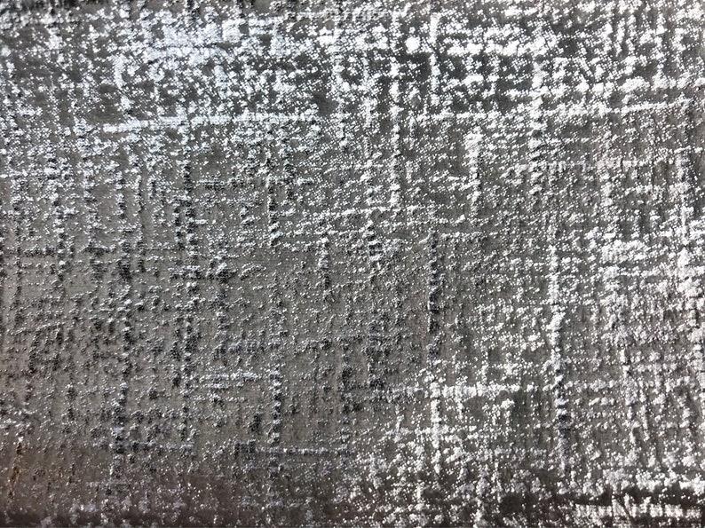Steel and Embossed Metallic Silver On Velvet