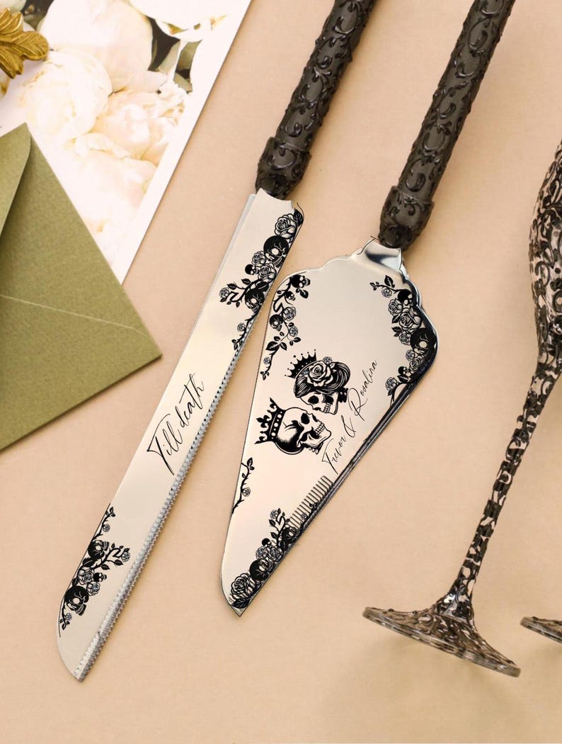 May include: A cake knife and server set with black floral and skull designs. The knife has the text "Till death" and the server has the text "Forever & Always". The handles are black and textured.