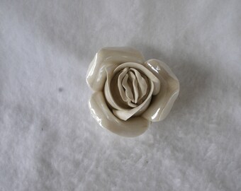 Sculpted Vulva in a White Ceramic Rose Candleholder 185
