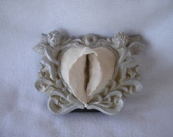 Sculpted Vulva in a Silver Painted Frame With Two Puttis (With Built-in Stand) 227