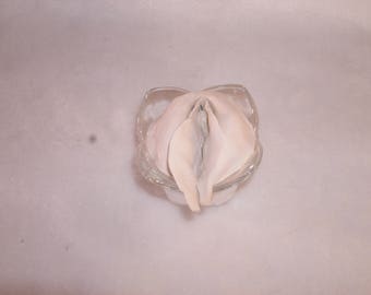 Sculpted Vulva in a Clear Glass Four Petal Flower Candleholder 146