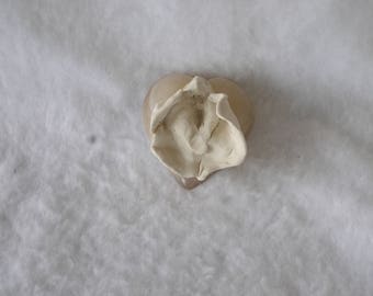 Sculpted Vulva on a Pink Opaque Glass Heart-Shaped Paperweight 182