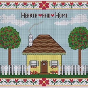 May include: Cross-stitch pattern depicting a yellow house with a brown roof, white picket fence, two green trees with red apples, and the text "Hearth ♥ and ♥ Home".