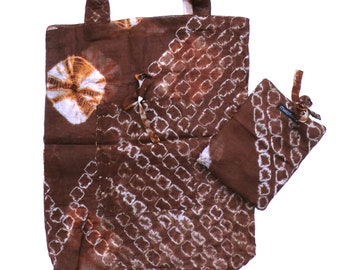 Small lightweight foldable shopping bag with ethnic pattern and artisanal dyeing from Mauritania in brown and orange