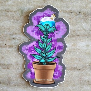 May include: A sticker featuring a teal plant in a brown pot, topped with a potion bottle. The plant is set against a purple and black galaxy-like background. The sticker has a gray outline and the text "artbymelforia" is visible.