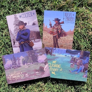 May include: Four rectangular art prints featuring Western-themed illustrations. One depicts a man in a blue coat with the word "COLTER". Another shows a figure with a gun, the text "NUEVO PARAISO". The others read "HORSE SHOE OVERLOOK" and "CLEMENS POINT".