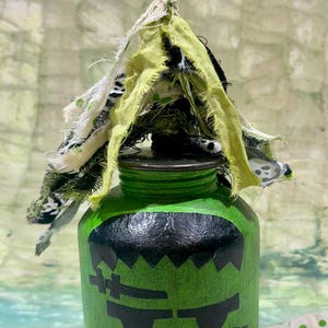 Vintage oil cans Halloween Frankenstein decorated vintage style Halloween folk art primitive