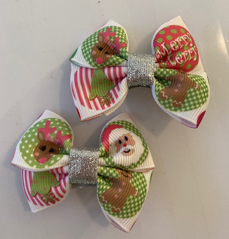 Beautiful Santa and Rudolph Christmas inspired hair bows for girls Look really cute over pig tails.