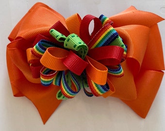 Beautiful Multi Colored Orange inspired hairbow for girls.